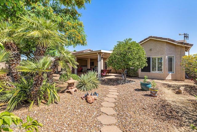 14819 W Lupine Ln, Surprise, AZ 85374 - rear view of house featuring stucco siding and a patio area