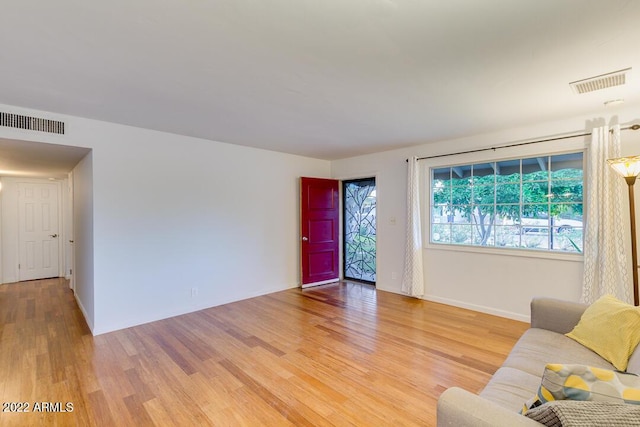 803 W 18th St, Tempe, AZ 85281 - living area featuring light wood-style floors and baseboards