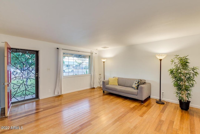 803 W 18th St, Tempe, AZ 85281 - living area featuring light wood-style floors and baseboards