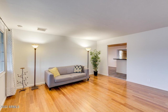 803 W 18th St, Tempe, AZ 85281 - sitting room featuring wood finished floors and baseboards