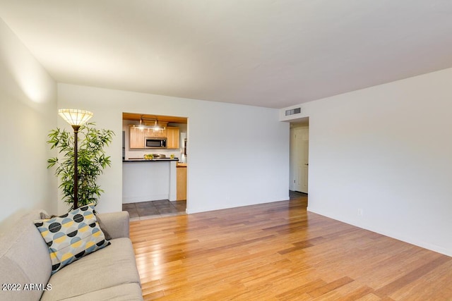 803 W 18th St, Tempe, AZ 85281 - living area featuring light wood-type flooring