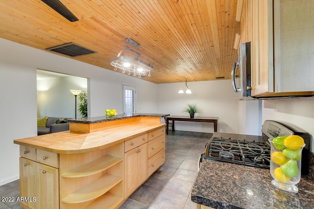 803 W 18th St, Tempe, AZ 85281 - kitchen featuring butcher block countertops, stainless steel microwave, gas stove, light brown cabinets, and wood ceiling