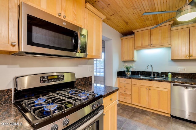 803 W 18th St, Tempe, AZ 85281 - kitchen with stainless steel appliances, a sink, light brown cabinets, wood ceiling, and dark stone counters