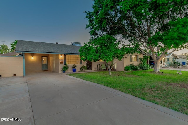 803 W 18th St, Tempe, AZ 85281 - view of front of house featuring driveway, a front lawn, and a carport