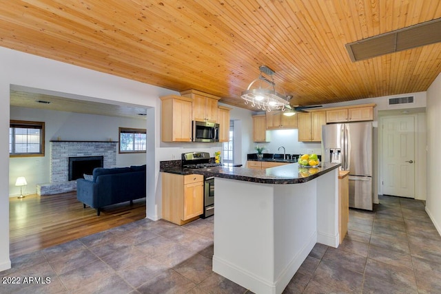 803 W 18th St, Tempe, AZ 85281 - kitchen featuring appliances with stainless steel finishes, a sink, dark countertops, light brown cabinetry, and wood ceiling
