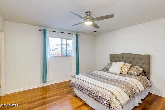 803 W 18th St, Tempe, AZ 85281 - bedroom featuring wood finished floors, baseboards, and a ceiling fan