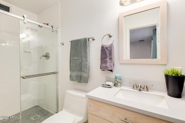 803 W 18th St, Tempe, AZ 85281 - bathroom with vanity, a shower stall, and toilet