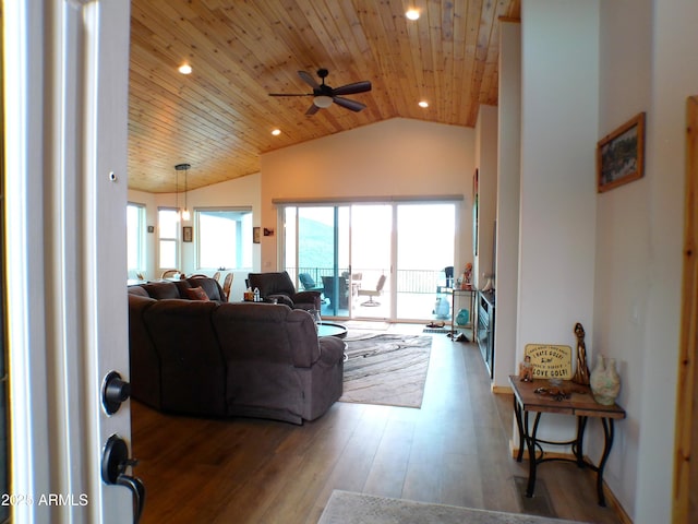 living room featuring recessed lighting, a ceiling fan, vaulted ceiling, wood finished floors, and wooden ceiling