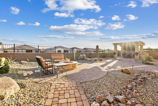 view of patio / terrace featuring a fire pit