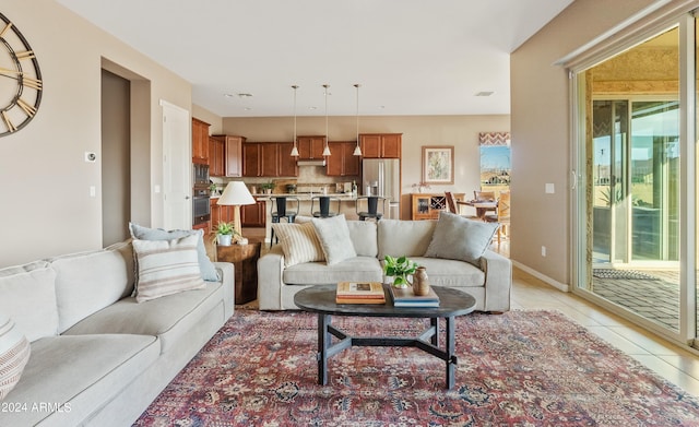 living room featuring light tile patterned flooring