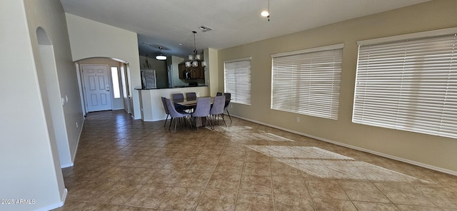 dining area with tile patterned floors