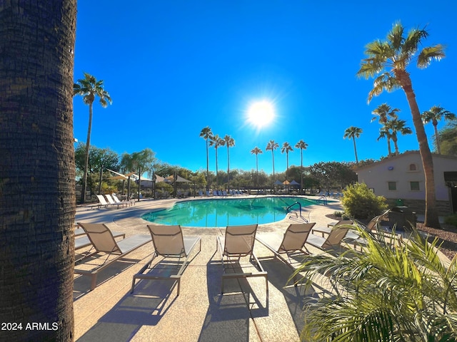 community pool featuring a patio