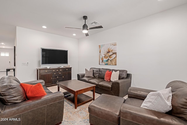 living area featuring recessed lighting and a ceiling fan