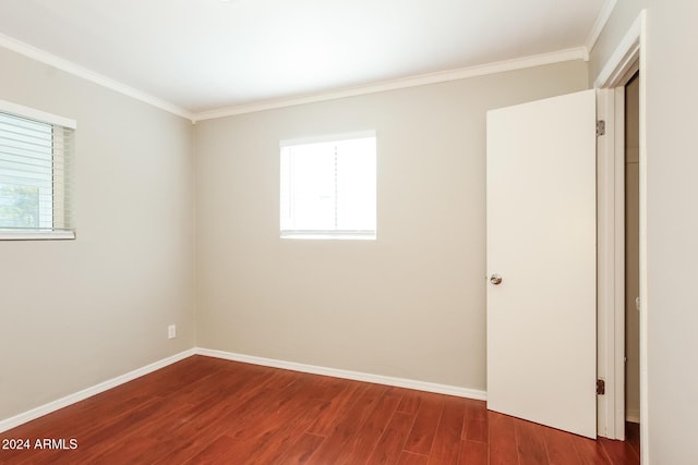 6219 S 12th Pl, Phoenix, AZ 85042 - unfurnished room featuring ornamental molding, wood finished floors, and plenty of natural light