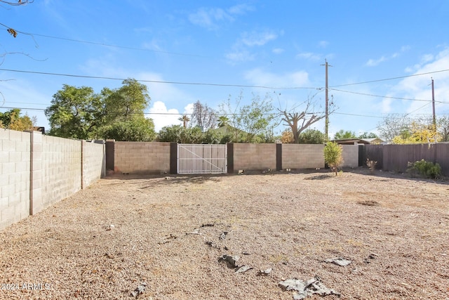 6219 S 12th Pl, Phoenix, AZ 85042 - fenced backyard with a gate