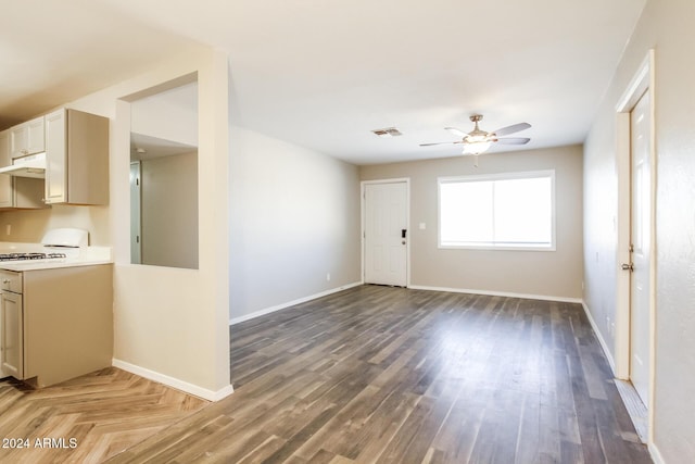 6219 S 12th Pl, Phoenix, AZ 85042 - unfurnished living room featuring a ceiling fan and wood finished floors