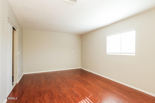 6219 S 12th Pl, Phoenix, AZ 85042 - unfurnished room featuring wood finished floors