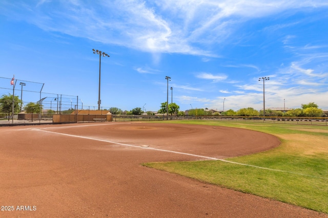 view of community featuring fence