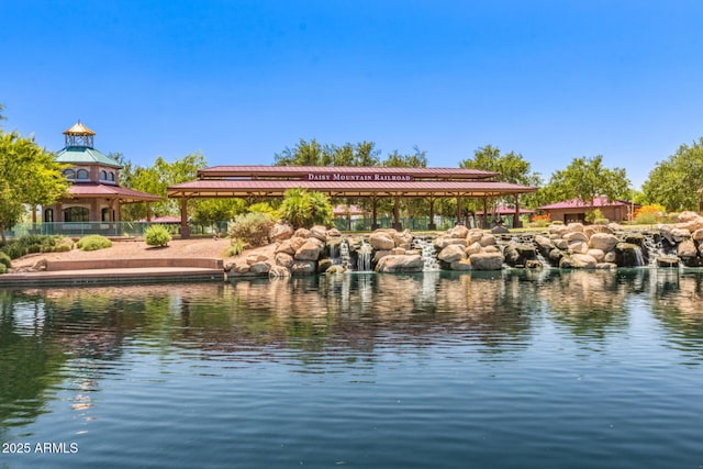 property view of water with a gazebo