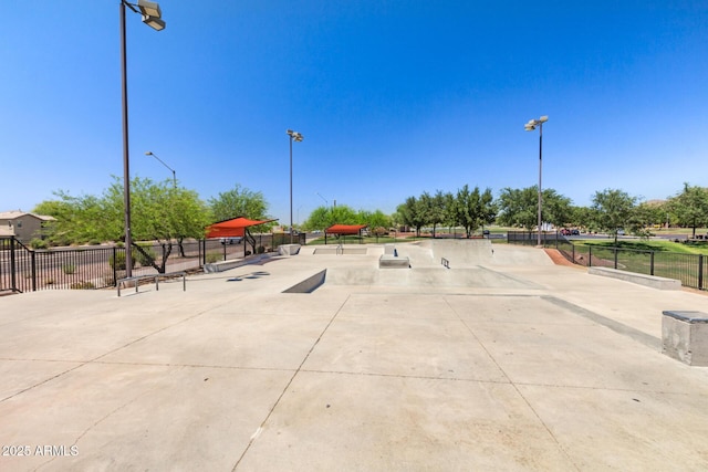 view of property's community featuring fence