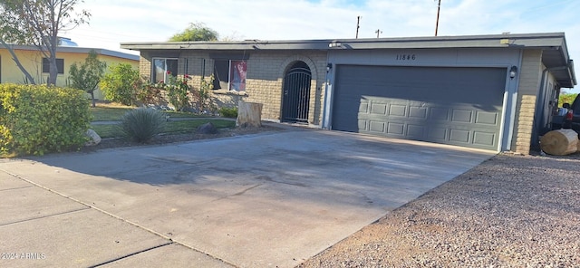 single story home with a garage