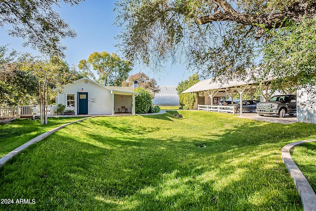 view of yard featuring a carport