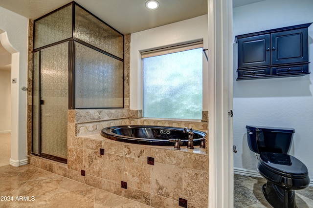 bathroom with toilet, separate shower and tub, and tile floors