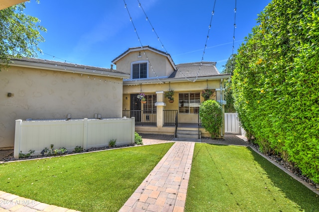 exterior space with a front yard