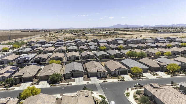 drone / aerial view featuring a mountain view and a residential view