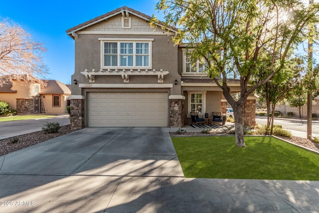 view of front facade with a garage and a front yard