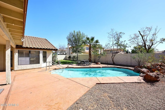 view of pool featuring a patio, a fenced backyard, and a fenced in pool