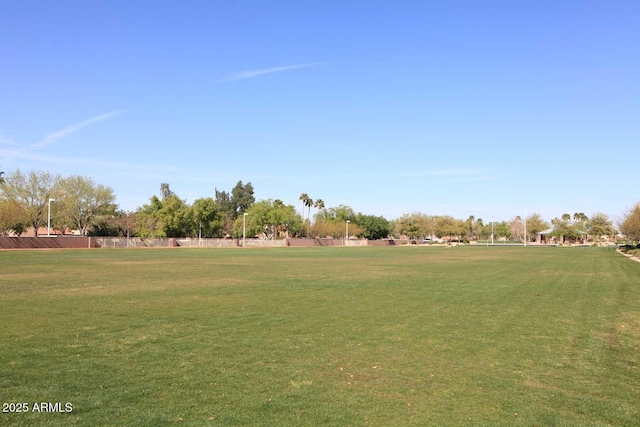 view of home's community featuring a lawn