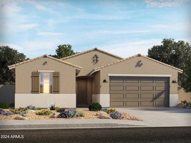 view of front of property with a garage