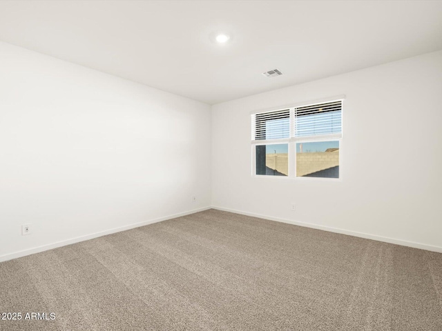 empty room featuring carpet