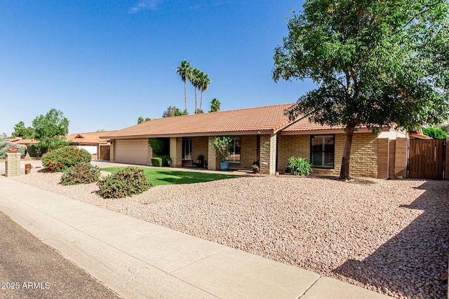 410 E Beck Ln, Phoenix, AZ 85022 - ranch-style house with a tiled roof, a garage, and fence