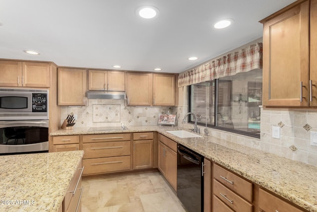 410 E Beck Ln, Phoenix, AZ 85022 - kitchen featuring black appliances, a sink, backsplash, light stone counters, and recessed lighting