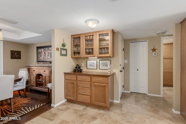 410 E Beck Ln, Phoenix, AZ 85022 - bar area featuring baseboards