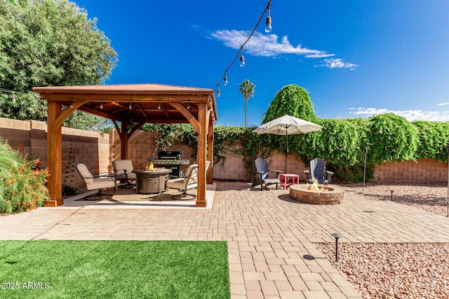 410 E Beck Ln, Phoenix, AZ 85022 - view of patio featuring an outdoor fire pit, a gazebo, and a fenced backyard