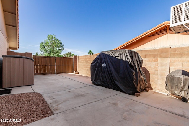 410 E Beck Ln, Phoenix, AZ 85022 - view of patio / terrace with a fenced backyard, central air condition unit, and a gate