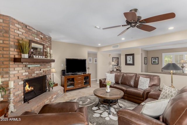 410 E Beck Ln, Phoenix, AZ 85022 - living area featuring a fireplace, a ceiling fan, and recessed lighting