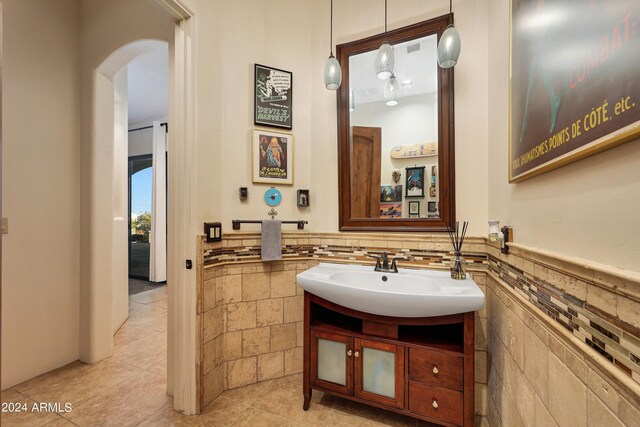 28217 N 139th St, Scottsdale, AZ 85262 - bathroom with vanity, wainscoting, tile patterned flooring, and tile walls