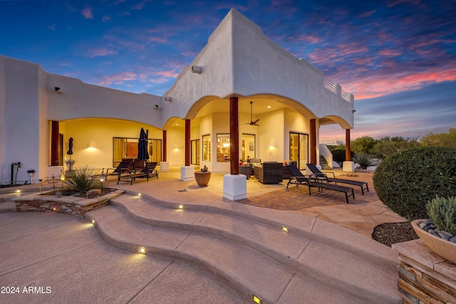28217 N 139th St, Scottsdale, AZ 85262 - patio terrace at dusk featuring outdoor lounge area and a patio