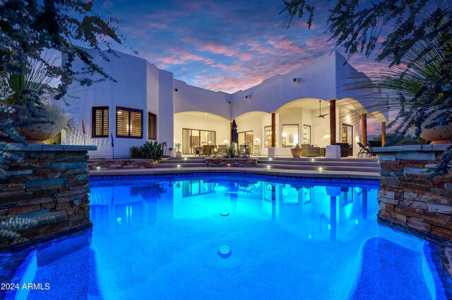 28217 N 139th St, Scottsdale, AZ 85262 - pool at dusk featuring an outdoor pool and a patio area
