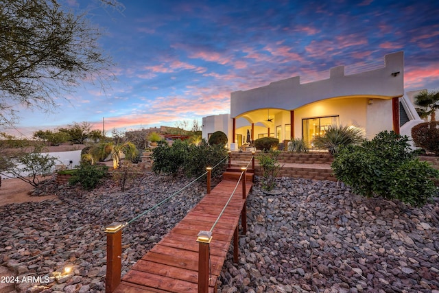 view of yard at dusk