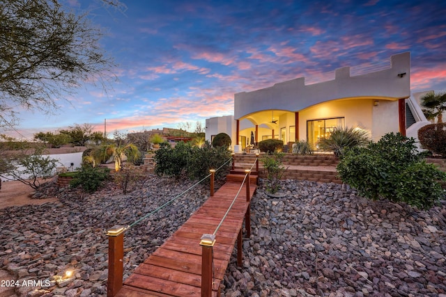 28217 N 139th St, Scottsdale, AZ 85262 - pueblo revival-style home featuring stucco siding and stairway