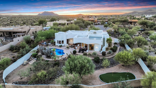28217 N 139th St, Scottsdale, AZ 85262 - aerial view at dusk of a mountain view and view of pool area