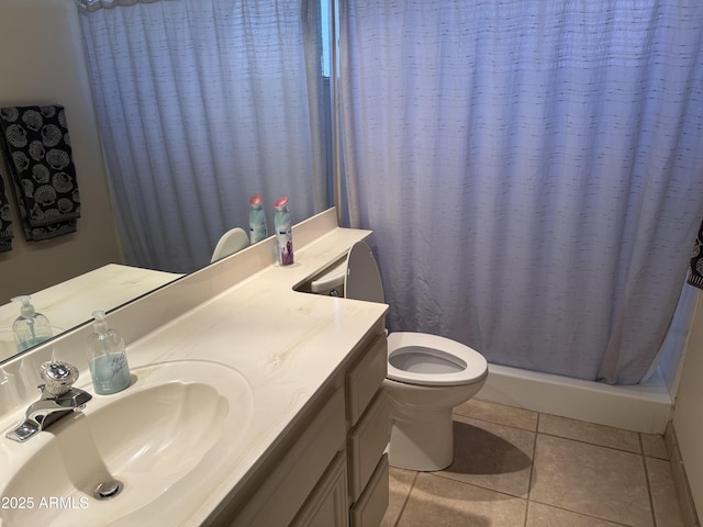 full bath with tile patterned floors, toilet, vanity, and a shower stall