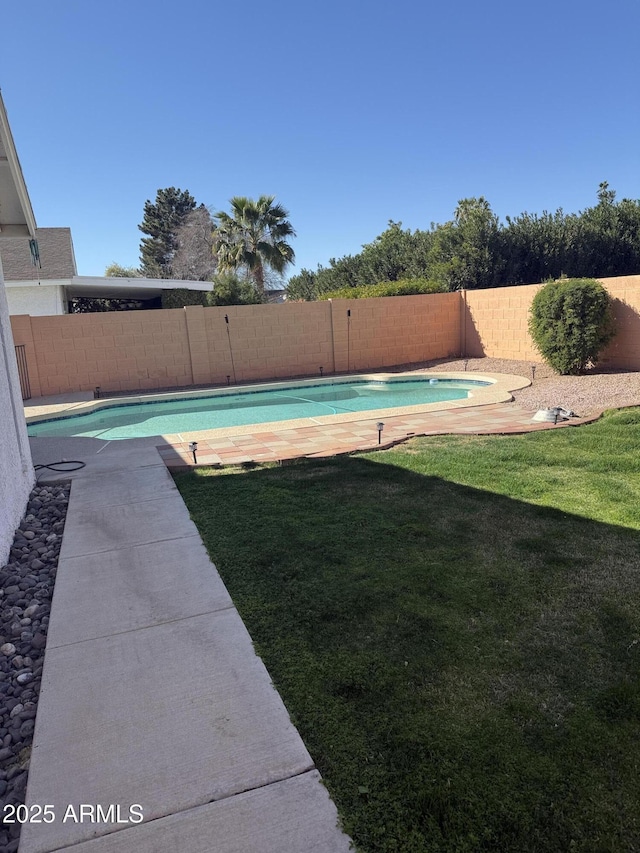 view of yard with a fenced backyard and a fenced in pool