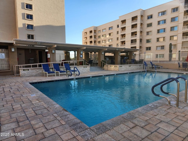 pool with a patio