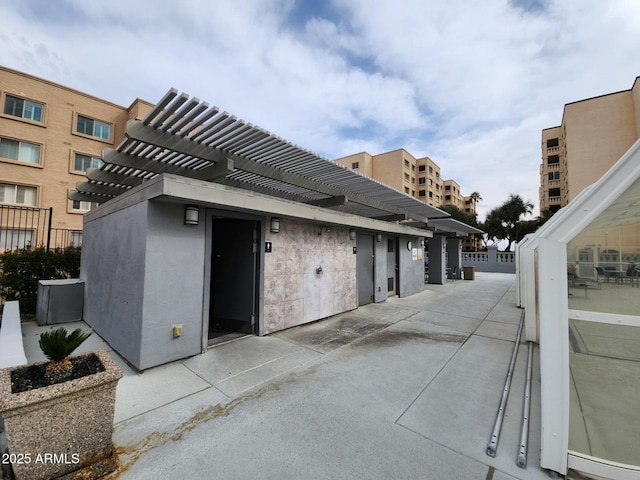 exterior space featuring a pergola